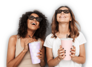 portrait-of-two-smiling-young-women-in-3d-glasses-4L9GB6W